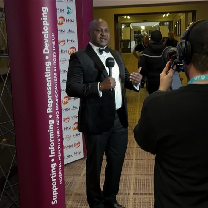 On camera at an industry event